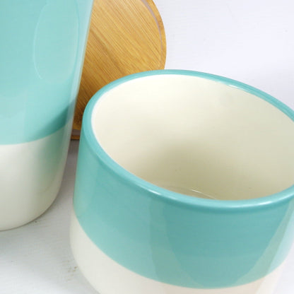 Set of Three Canisters Green Ceramic Storage Jars with Lids