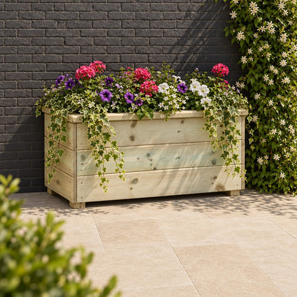 Deluxe Large Wooden Trough Planter planted in a garden setting