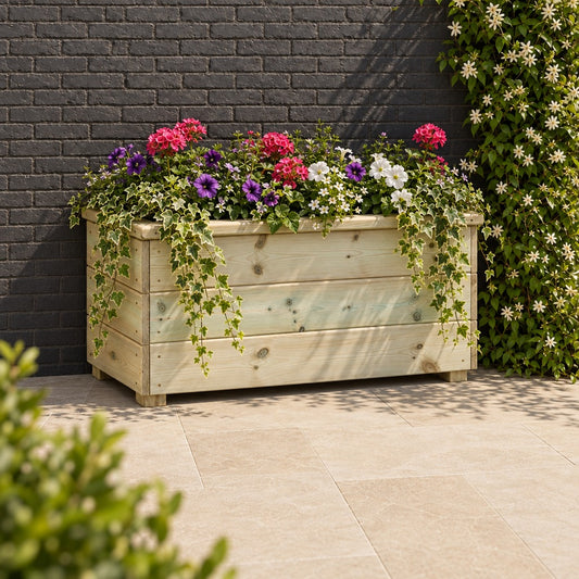 Deluxe Large Wooden Trough Planter planted in a garden setting
