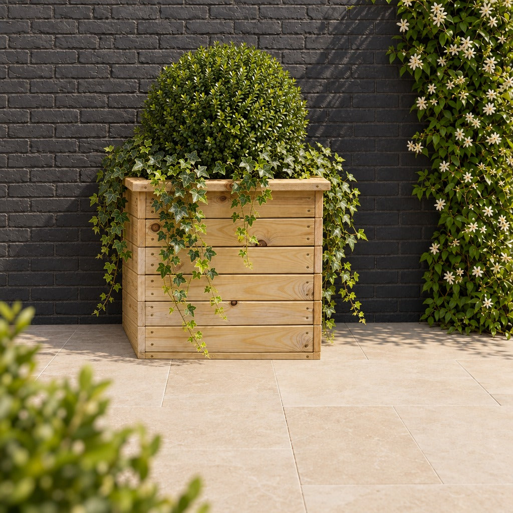 Deluxe Square Natural Redwood Planter planted in a garden setting