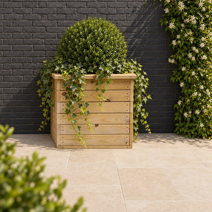 Deluxe Square Natural Redwood Planter planted in a garden setting